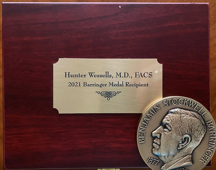 Photo of plaque with Dr. Wessells' name, and the Barringer Medal