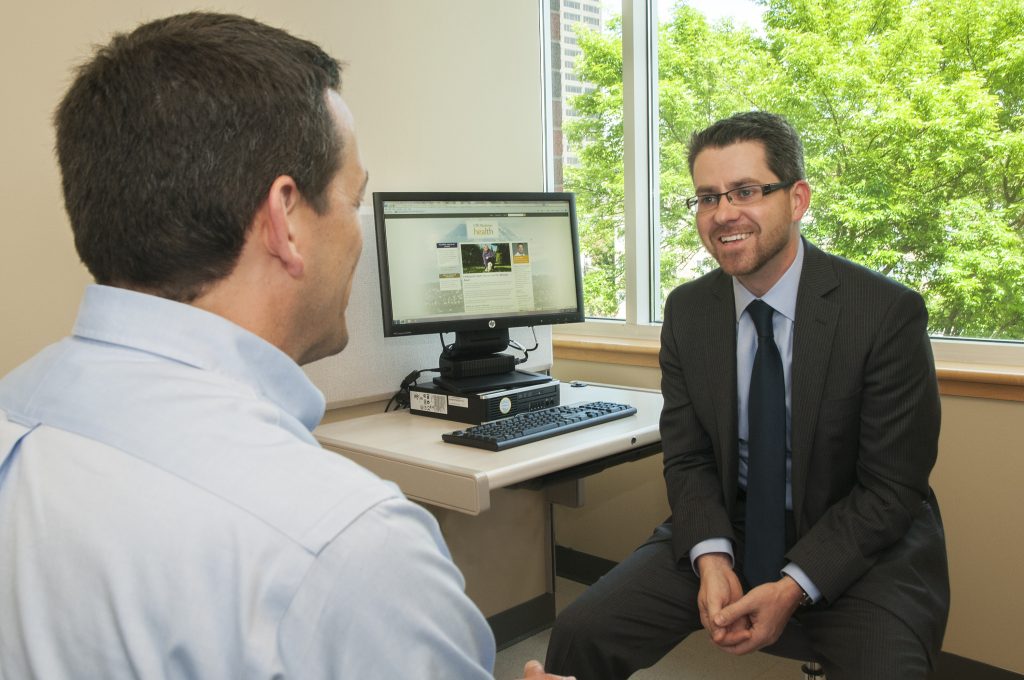 Thomas Walsh with a patient